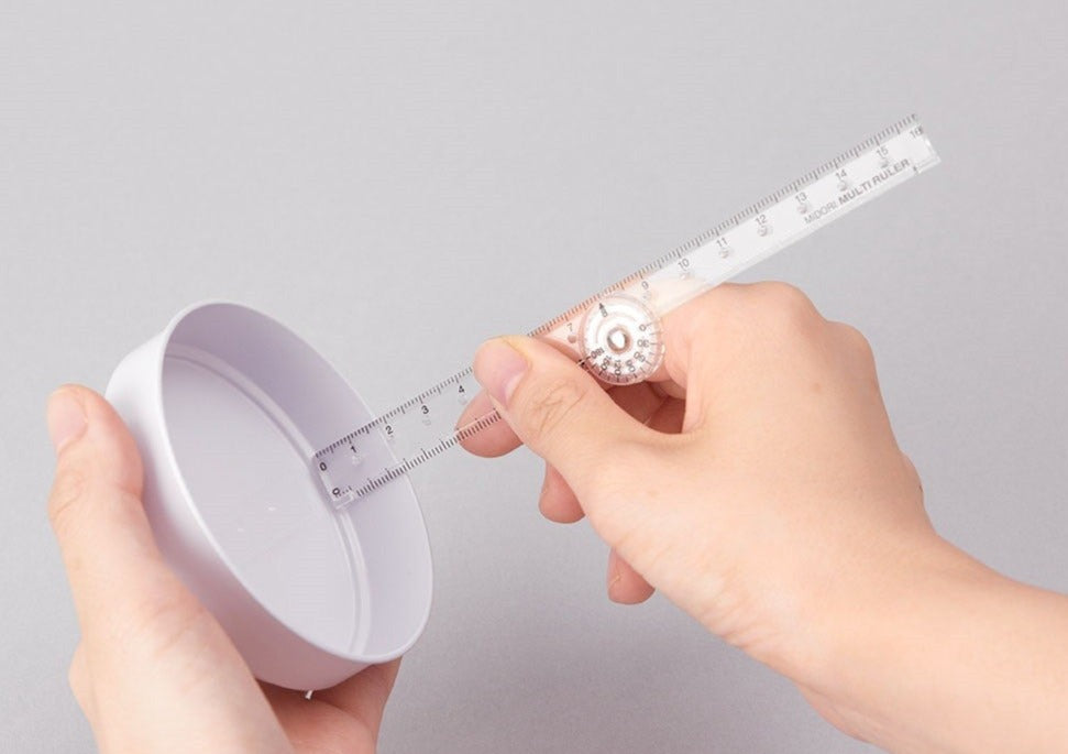 plastové skládací pravítko ~ 16 cm